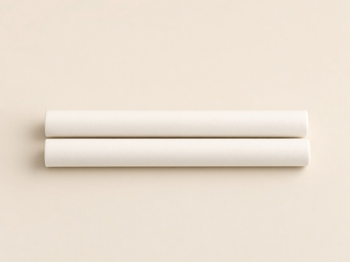 Two white cotton scent sticks for the Kakara Vent Diffuser