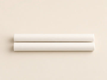 Two white cotton scent sticks for the Kakara Vent Diffuser