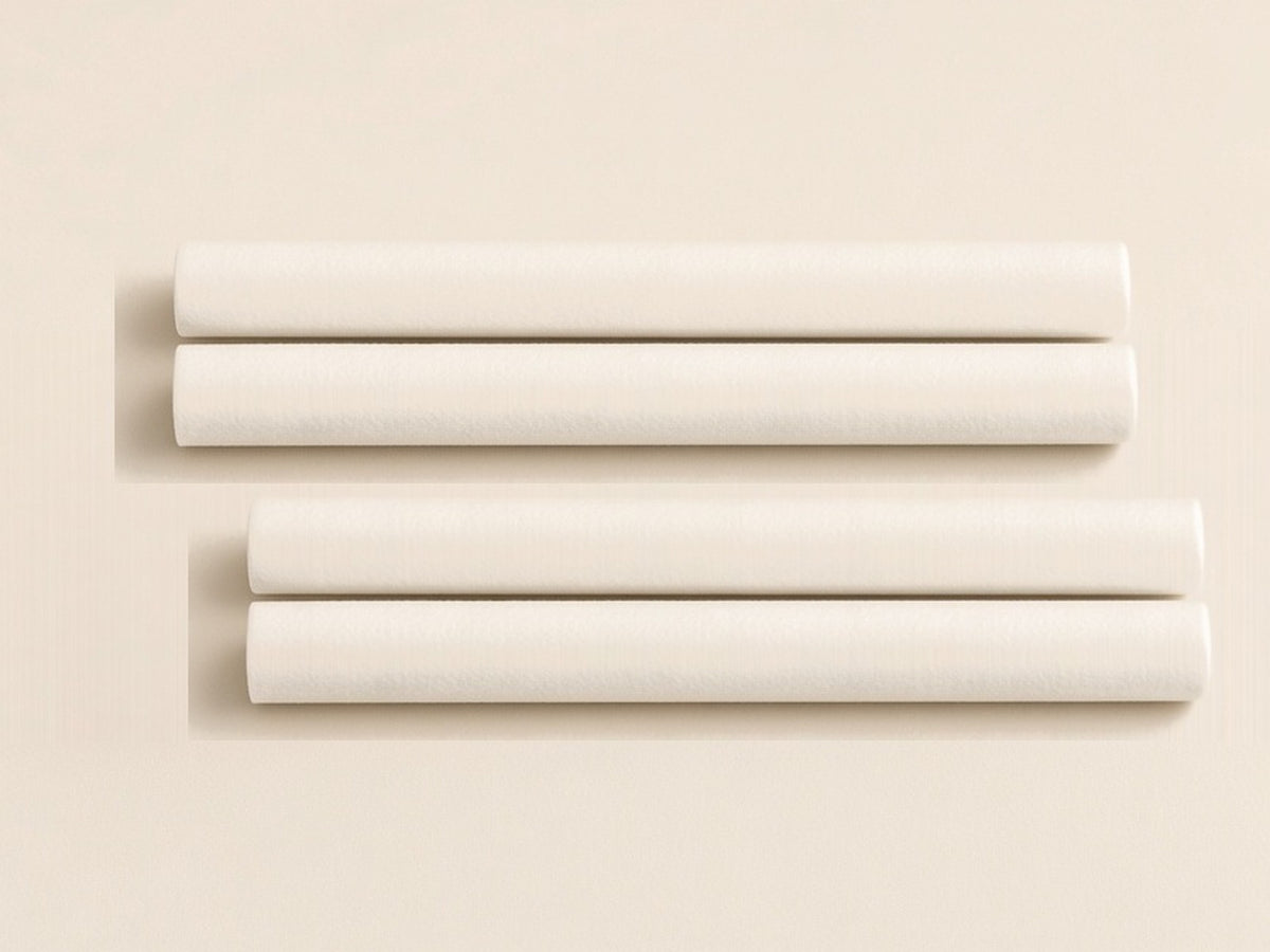 Four white cotton scent sticks for the Kakara Vent Diffuser