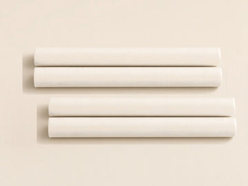 Four white cotton scent sticks for the Kakara Vent Diffuser